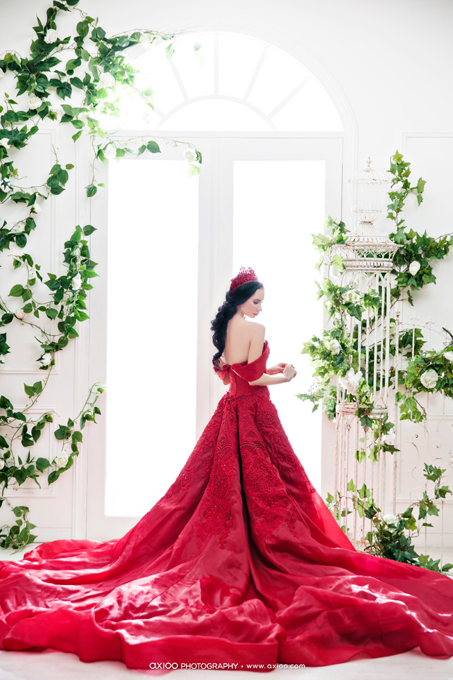 Statement-making red gown captured flawlessly to present sophisticated charm!