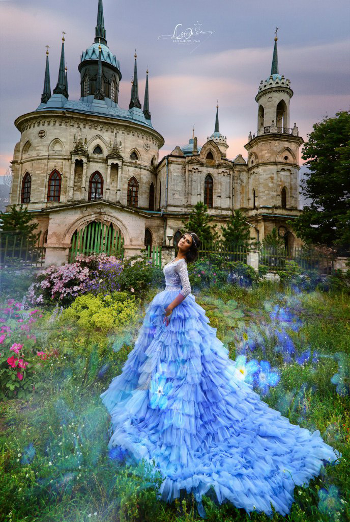 Wow. Just wow! This castle bridal portrait featuring a romantic blue ruffled gown is a fairy tale come true!