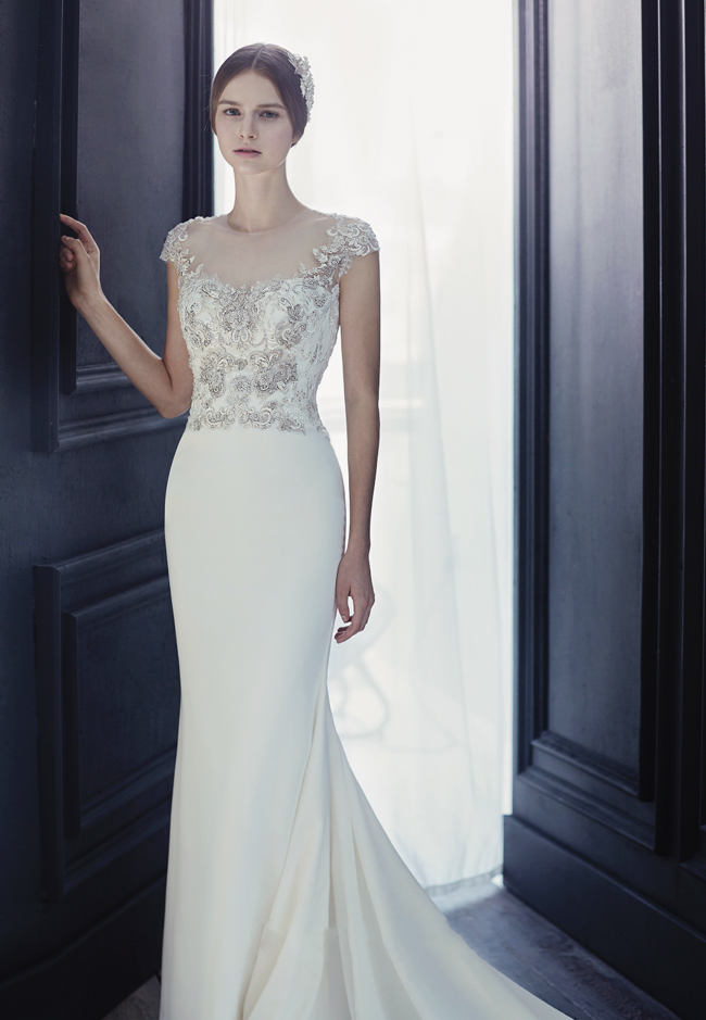 Playing with sophisticated seaming and lavish gilded embroideries, this simple yet glamorous fitted gown from Sonyunhui is stop in your tracks beautiful!