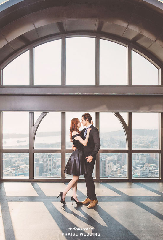 Contemporary stylish engagement photo featuring amazing city view!