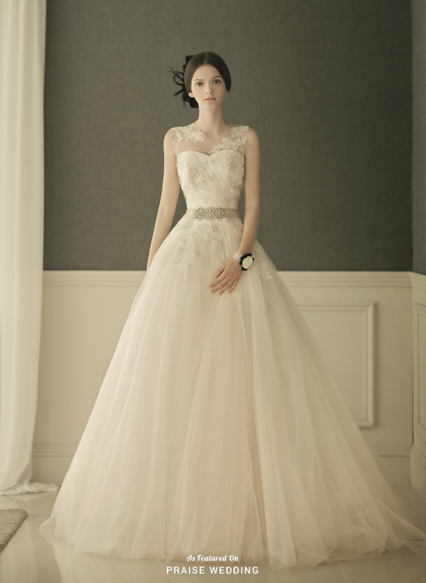 This chic elegant gown from Dearte featuring romantic floral embroideries and a jeweled sash is simple yet charming!