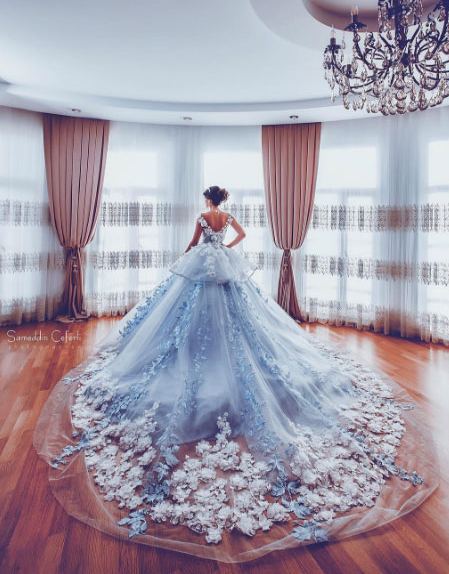 A jaw-droppingly beautiful bridal portrait featuring the Bride's romantic custom blue gown!