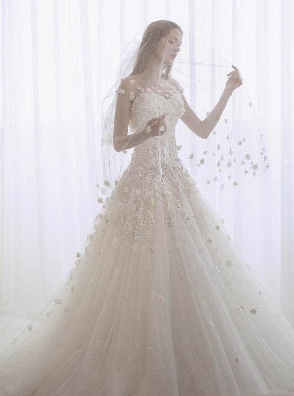 Simple yet beautiful, this dreamy gown from Bridal Hui featuring chic floral accents is making us swoon!