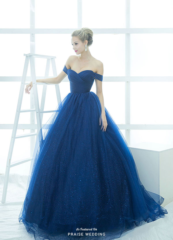 We'd love to twirl around in this romantic starry night blue gown from La Belle Couture!