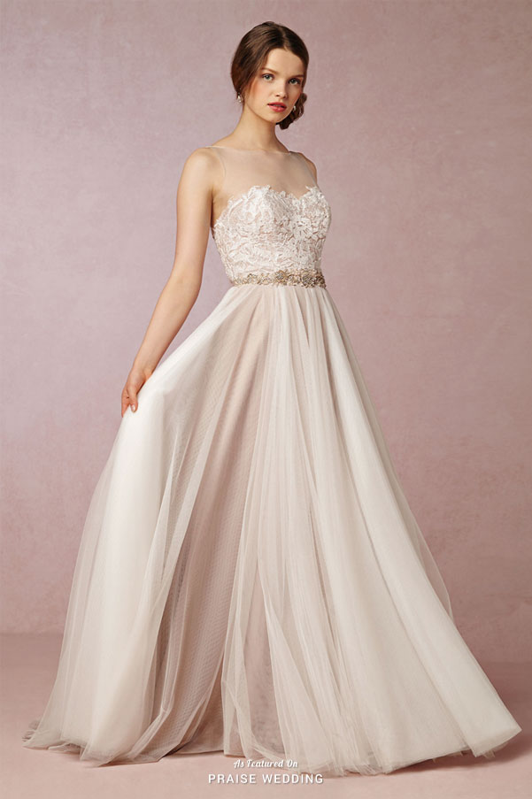 In love with this romantic wedding dress from BHLDN featuring a dreamy flowy tulle skirt and floral covered bodice!