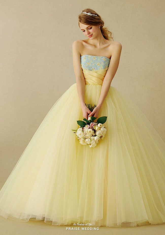 This dreamy yellow gown from Takami Bridal is fit for a fairy tale princess!