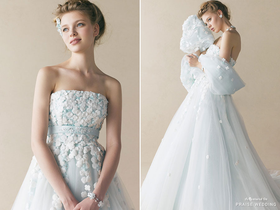 This airy blue gown from Anteprima Bridal featuring snowflake-inspired floral embellishments is dreamy sophistication at its best!