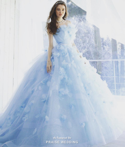 We can't resist this dreamy sky blue gown from Kiyoko Hata featuring romantic 3D floral embellishments!