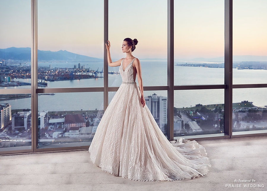 An unconventional wedding dress from Eddy K featuring a fashion-forward silhouette with a metallic touch!