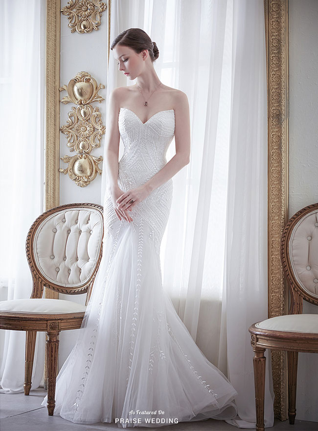 Head over heels in love with this graceful fitted gown from La Poeme featuring glittering vine embroideries!