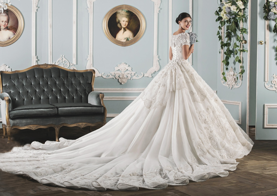 Classic wedding dress from Natalia Wedding Style infused with metallic thread accents and lavish detailing!
