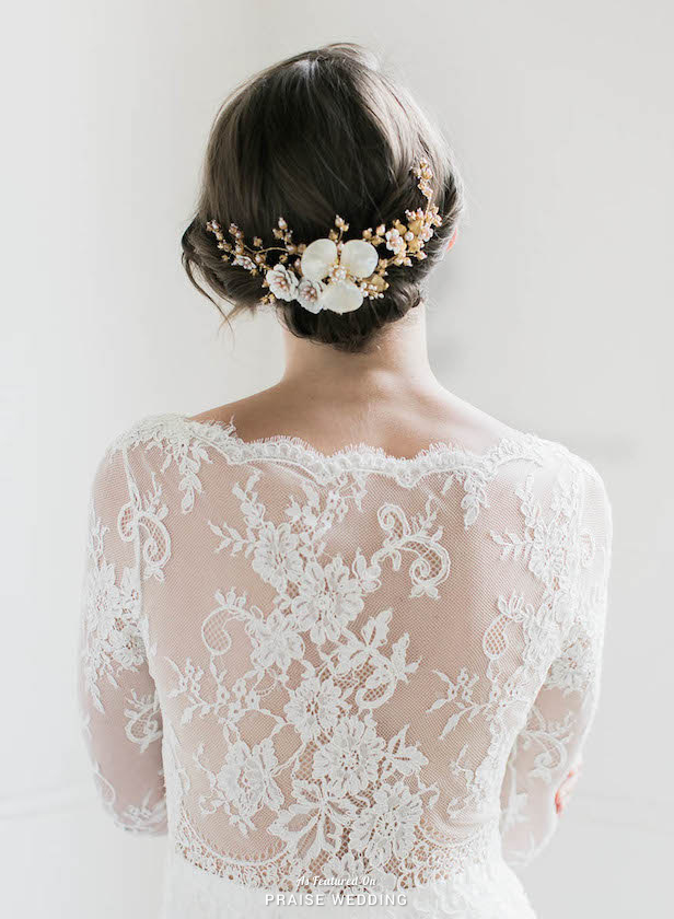 Make a dramatic yet delicate statement with this elegant floral bridal headpiece from Percy Handmade!