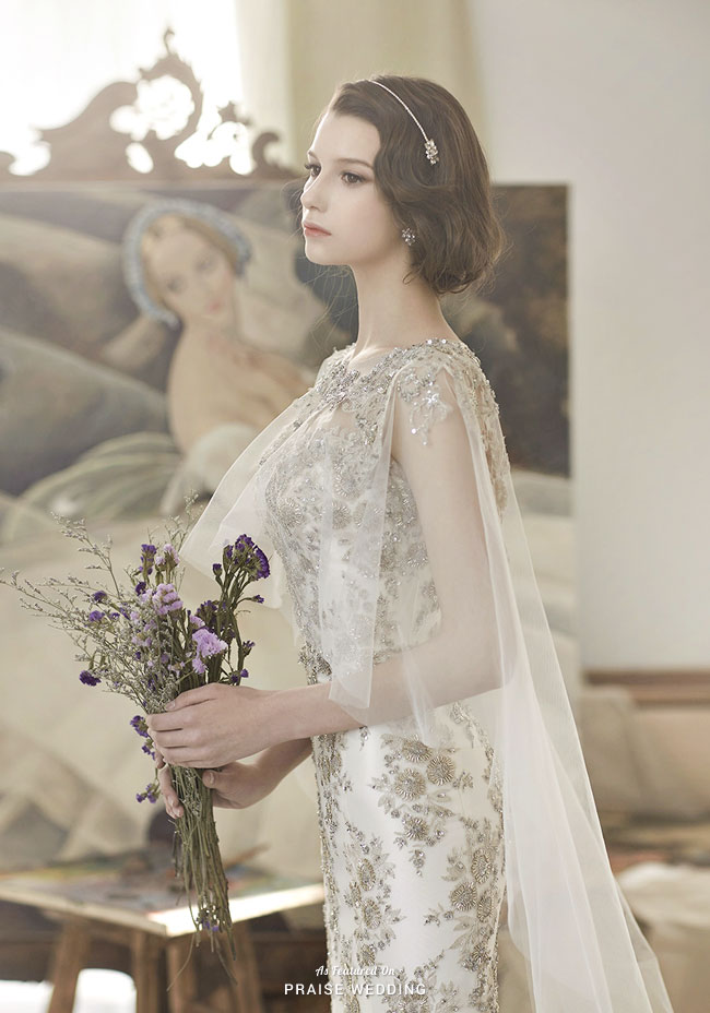A luxurious  vintage-inspired gown from Eileen Couture featuring a classic silhouette and lavish beading!