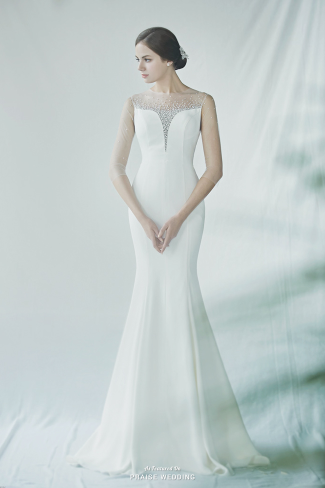 Incredibly beautiful gown from Hestia Wedding featuring lavish beading and a classic elegant silhouette!