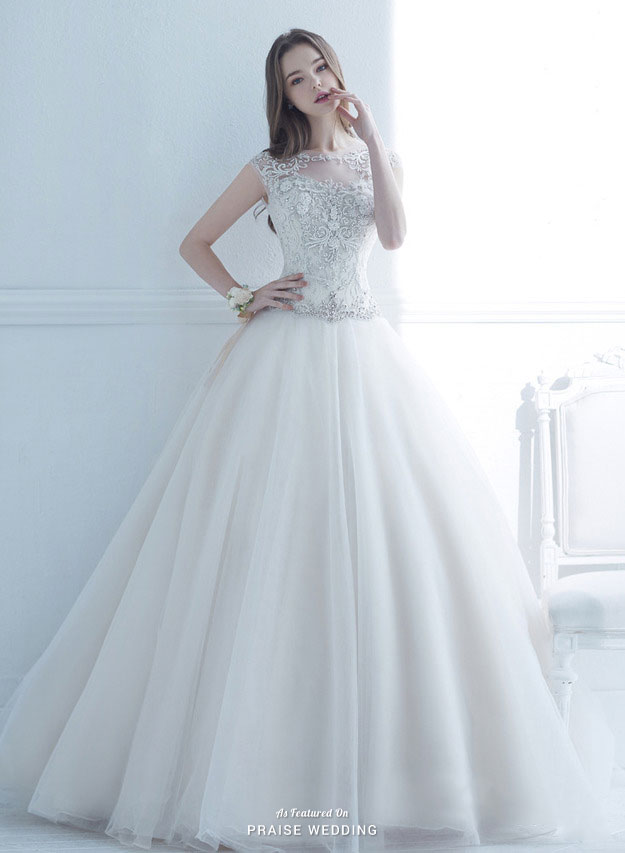 This classic wedding dress from Monica Blanche is fit for a princess!