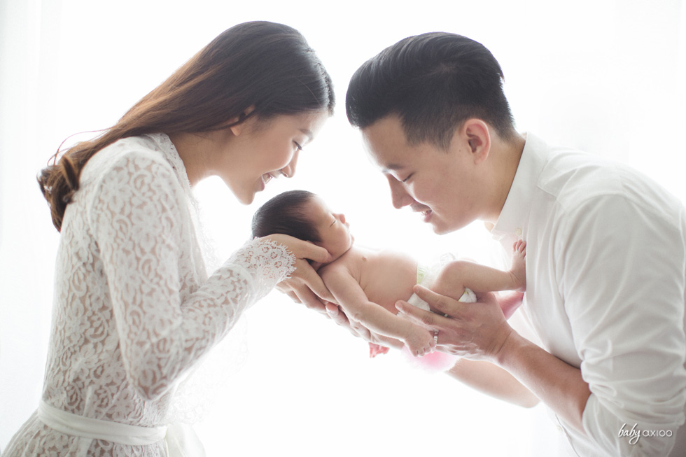 Your first breath took ours away! Such a lovely heart-warming newborn family portrait!