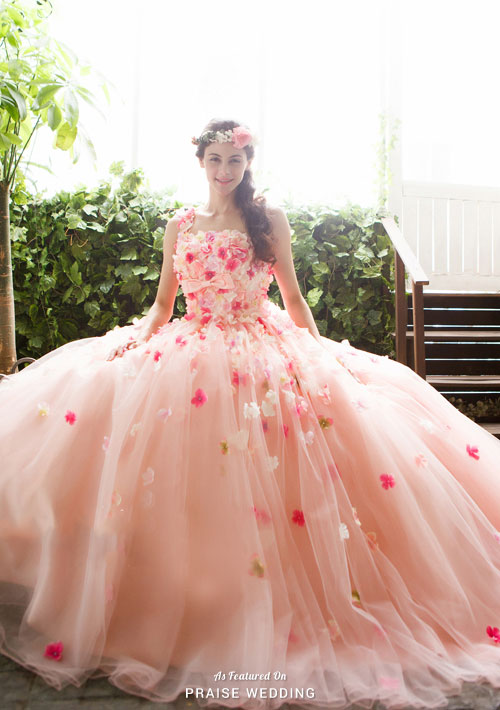 This pastel peach gown with dreamy floral accents from YNS Wedding is fit for the romantic bride at heart!