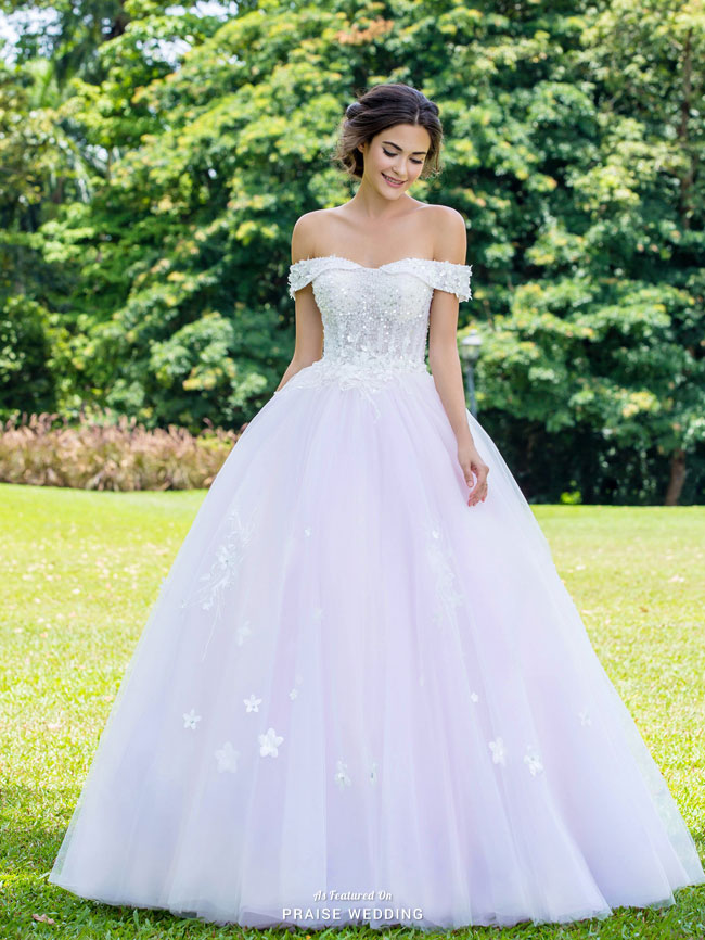 In love with this lovely off-the-shoulder wedding dress from Digio Bridal featuring chic floral and jewel applique and a sweet blush tulle skirt!