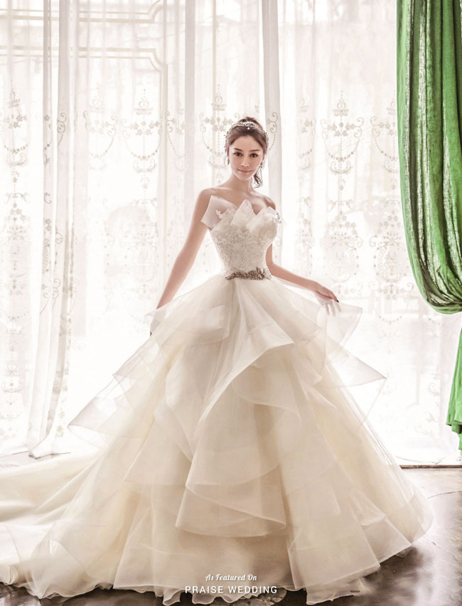 Oh this dress from Tyche Wedding is absolute bliss! For the princes bride at heart, nothing is sweeter than twirling in a beautiful ruffled ball gown!