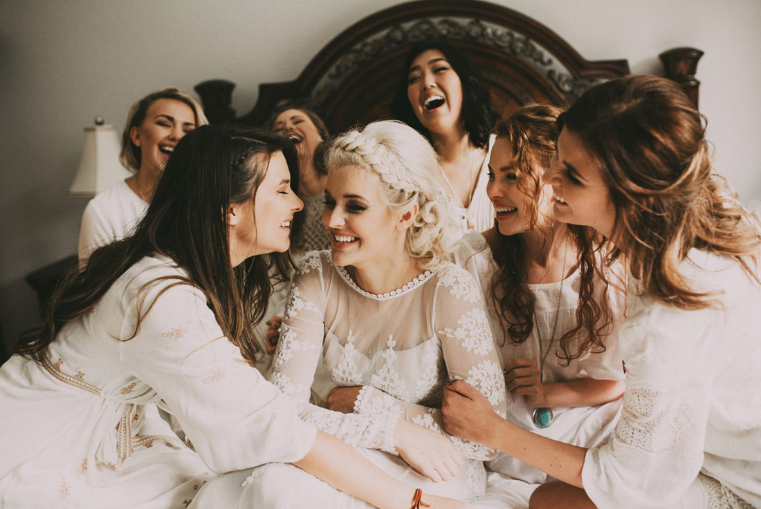 Such a sweet and natural wedding day photo with the bride and her besties! 