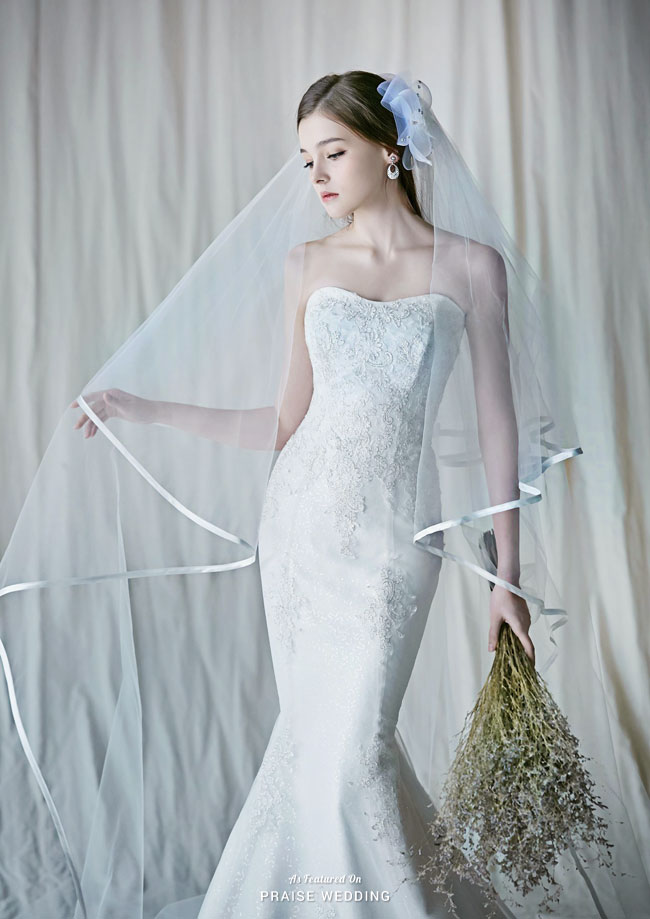 A classic dress with a classic veil are always a good pair! In love with this elegant combo from Lydia Bride!