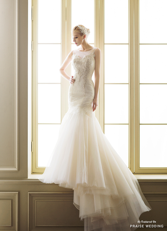 Elegant wedding dress from Bonheur Sposa featuring timeless silhouette and chic detailing!