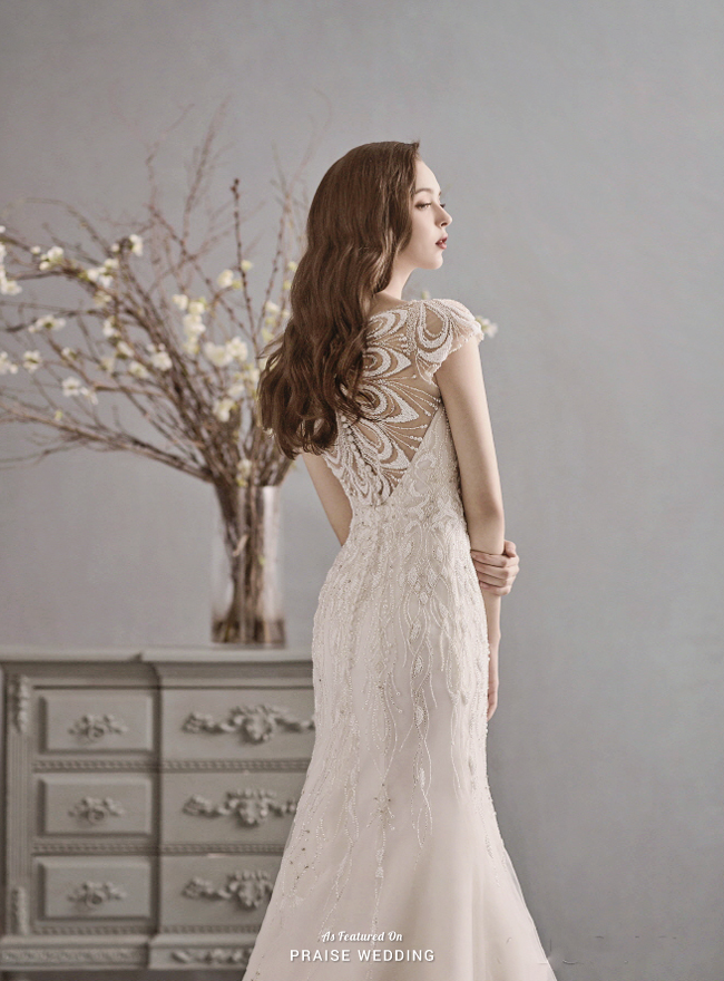 This wedding dress from La Poeme featuring vine-inspired jewel embellishments is filled with artistic romance!