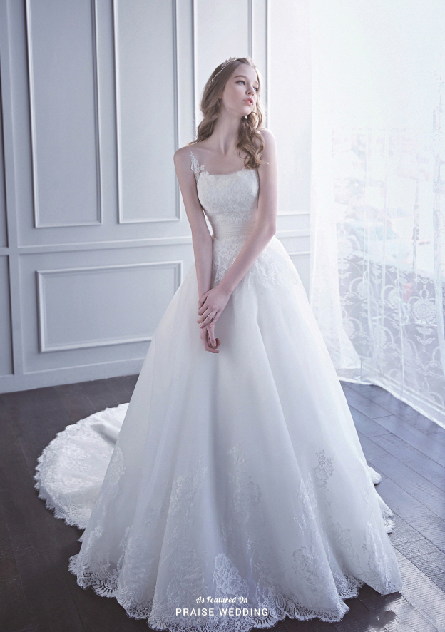This sweet white gown from Marie & Barbie featuring floral lace detailing is enchanting us with angelic romance!