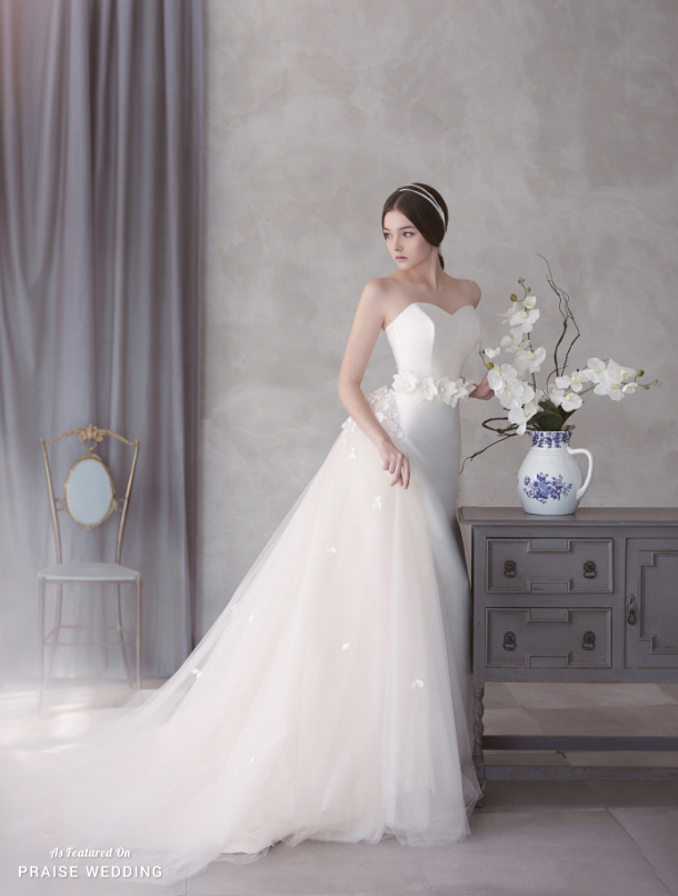 We're so in love with this stylish gown from J Sposa featuring a dreamy detachable train!