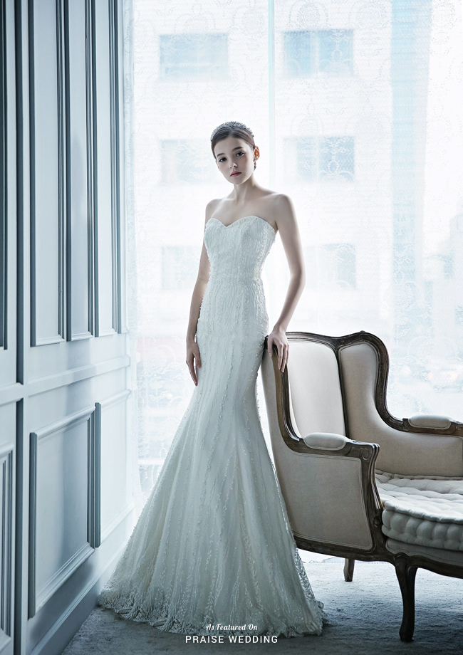 This classic white gown from Lydia Bride featuring glittering embellishments takes elegance to a new level!