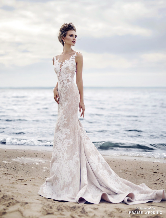 An elegant gown from Florence Wedding infused with subtle color and chic lace detailing!