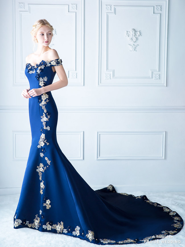Characterized by luxurious embroideries and a classic, feminine silhouette, this royal blue gown from Digio Bridal is a show-stopper!