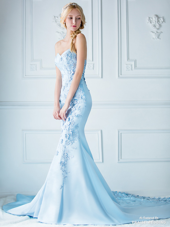 We are amazed by this baby blue gown from Digio Bridal featuring 3D florals delicately blooming on a fitted, classic silhouette