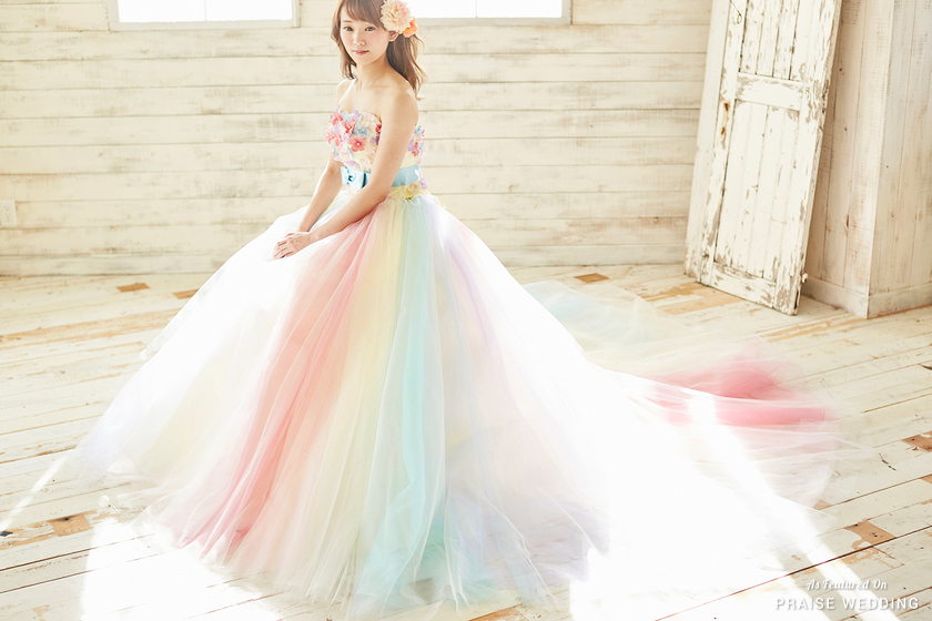 This soft pastel rainbow gown from TuNoah Wedding is a perfect fusion of whimsy and romance!