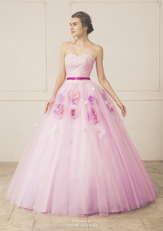 This romantic pink ball gown from Annie Bridal featuring 3D floral adornments and lace detailing is incredibly breathtaking!