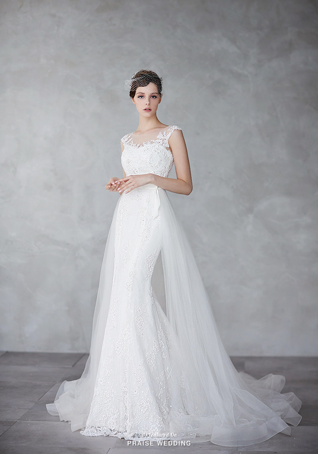 The perfect marriage of classic and contemporary, this sophisticated white gown from Ray & Co. evokes head-turning elegance!