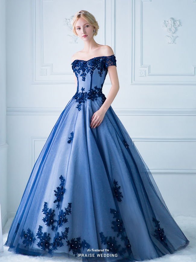 This statement-making royal blue gown from Digio Bridal featuring ultra-chic lace detailing is both timeless and unique!