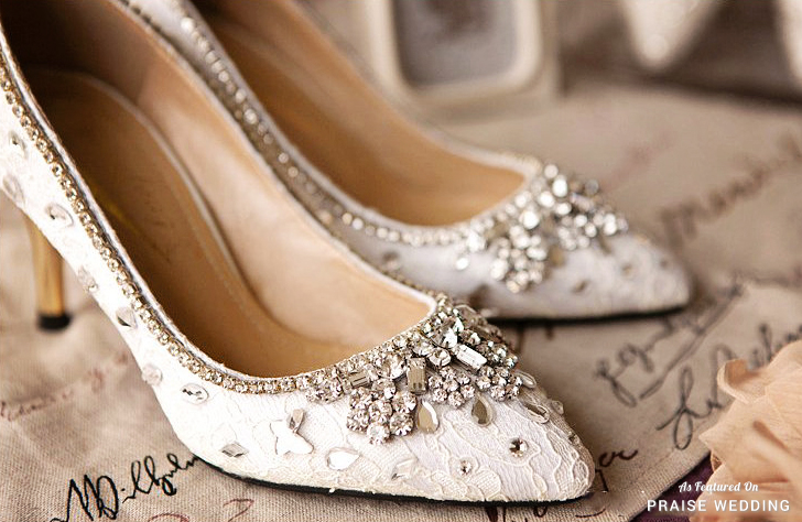 Classic handmade white wedding shoes adorned with sparkly crystals and jewels!