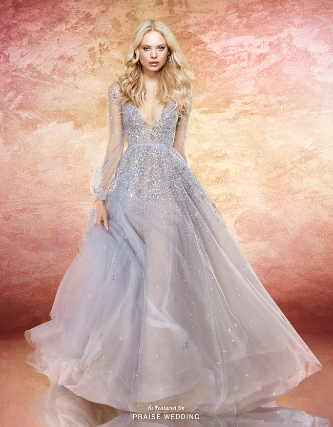 This stunning dress from Hayley Paige featuring glamarous jewel embellishments and ethereal color tone is a show stopper!