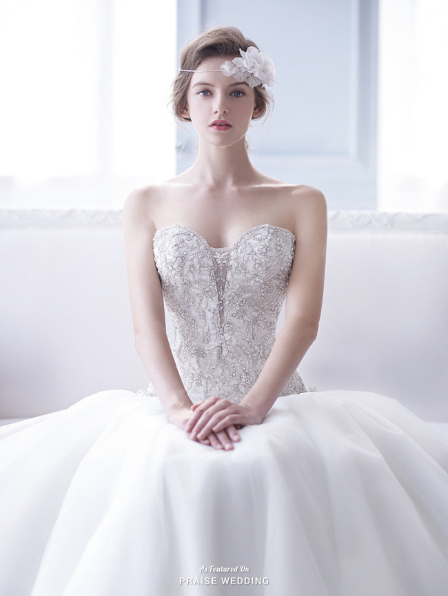 This sophisticated wedding dress from Cheramie features exquisite jewel ...