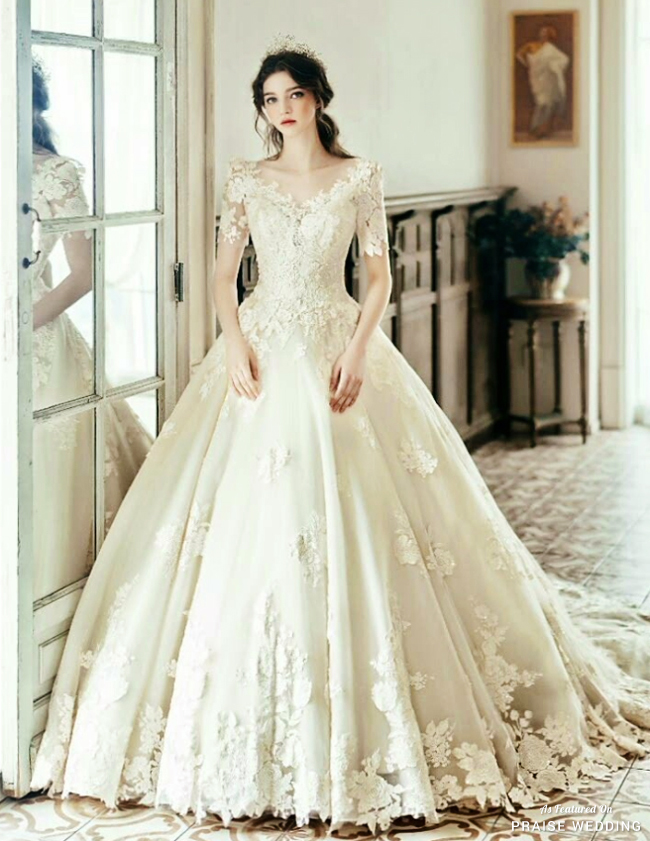 This princess-inspired wedding gown from Clara Wedding featuring floral ...