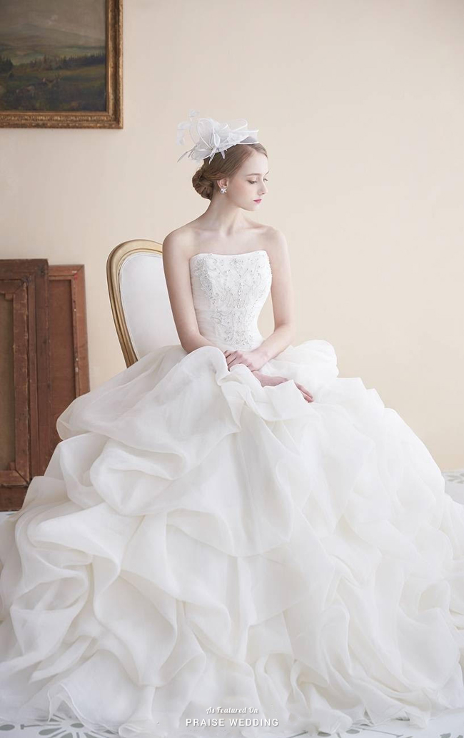 A refreshing pure white wedding gown from Michael Dress featuring ...