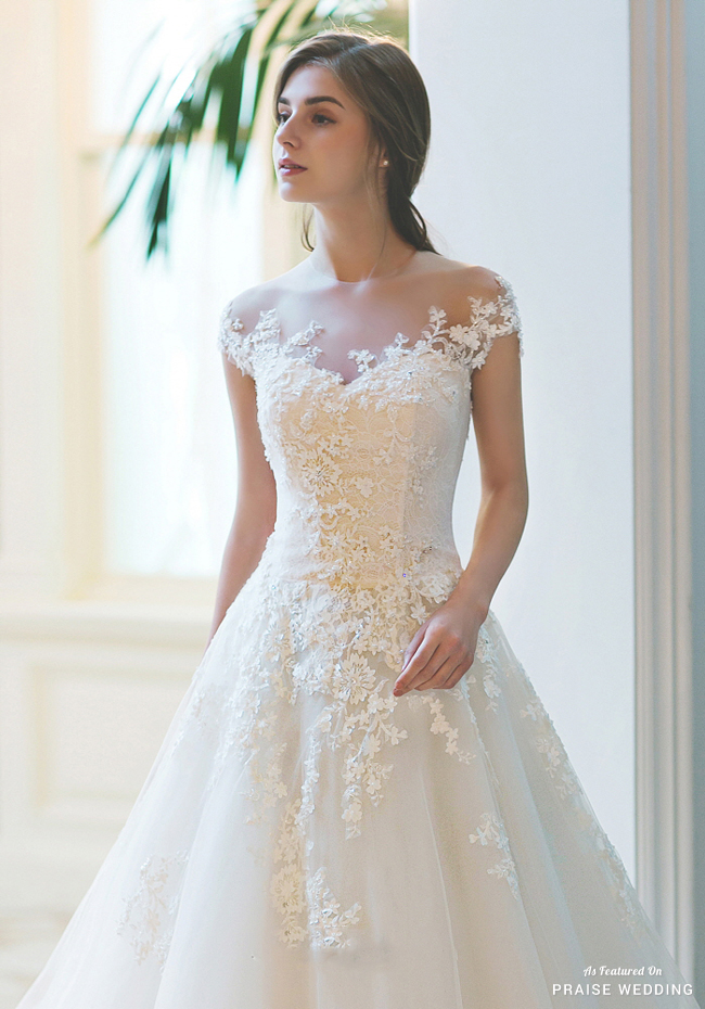 This classic wedding dress from Sonyunhui featuring delicate blooming ...