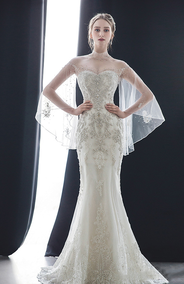 This jeweled gown from Blanc Neul featuring embellished airy tulle ...