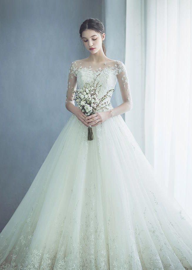 This wedding gown from Martin de Seven featuring sophisticated lace ...