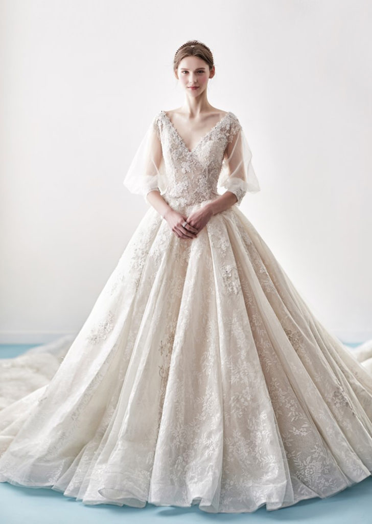 This vintage-inspired wedding gown from Louis Blanc featuring delicate ...