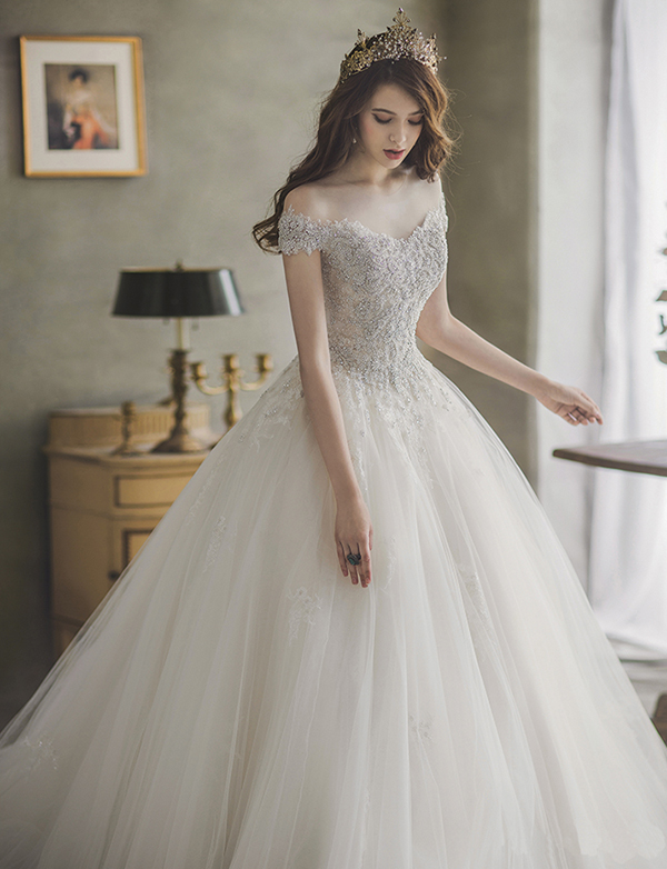 This princess-inspired ball gown from J Sposa featuring sophisticated ...