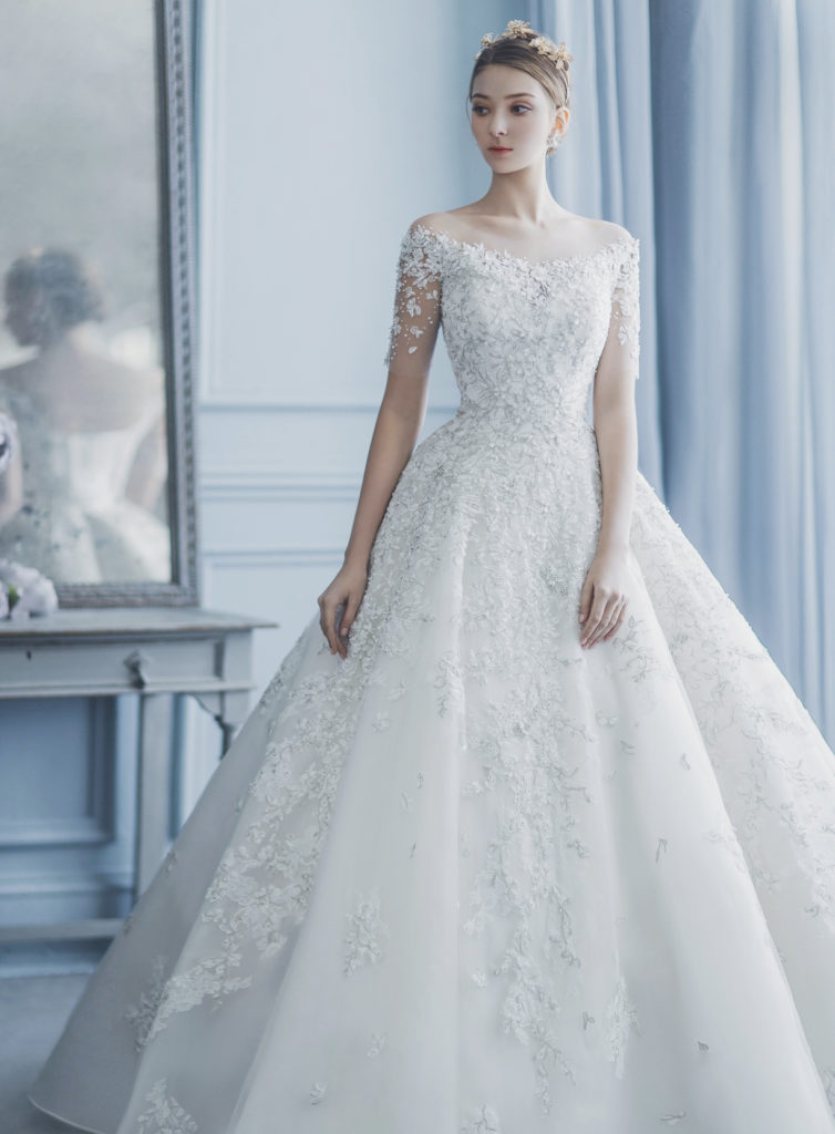 This off-the-shoulder wedding dress from Feliz Novia featuring ...